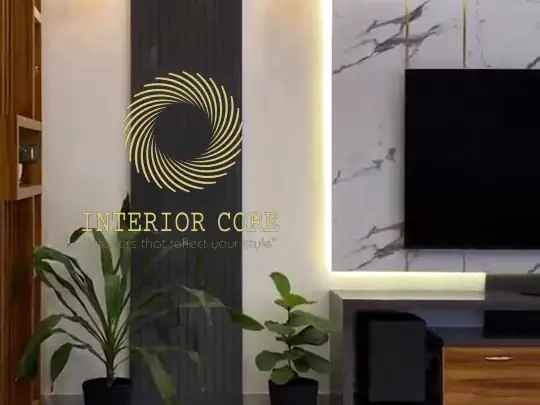 Office wall with the lit Interior Core sign between fluted timber and marble panelling